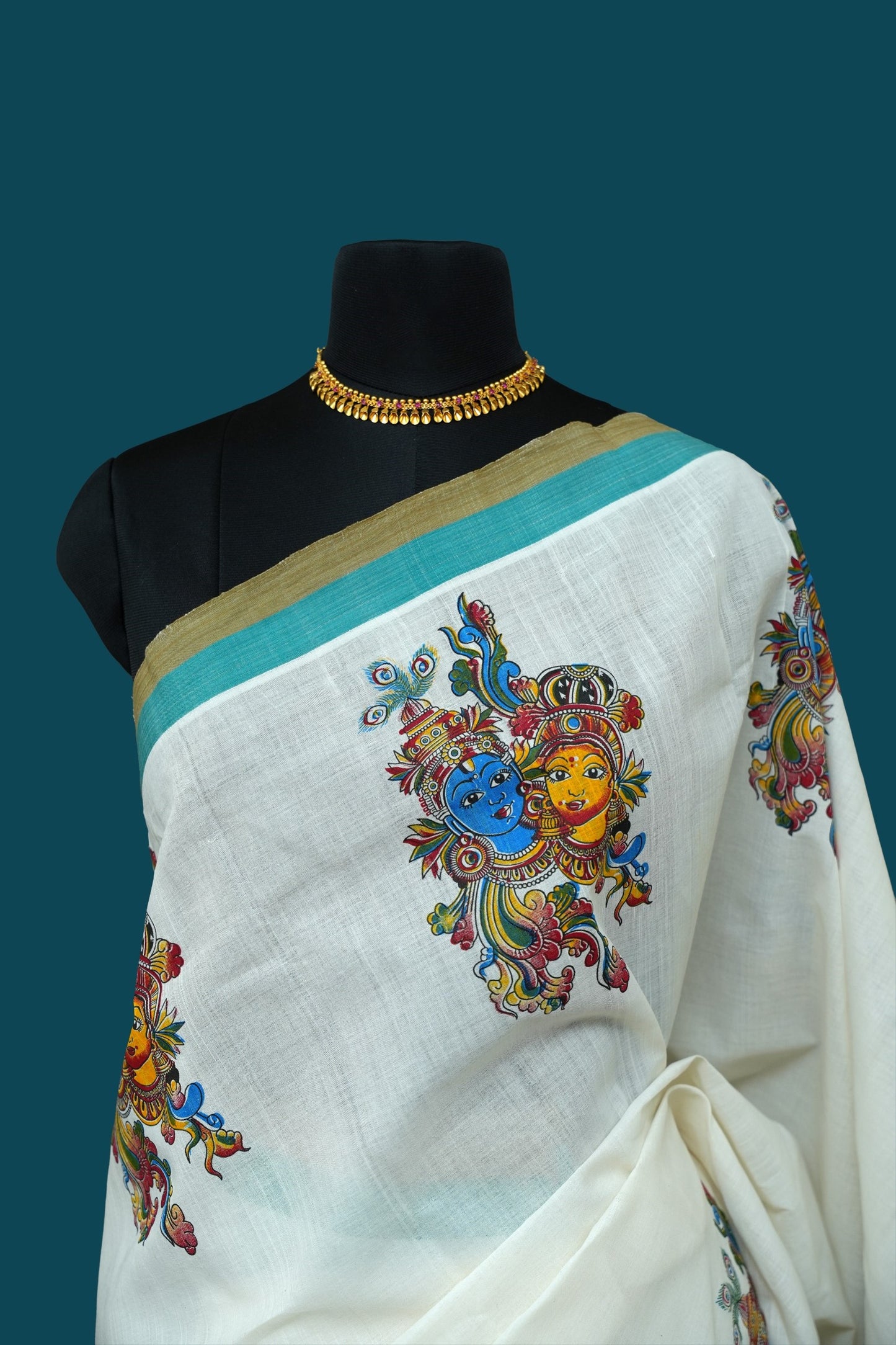 Erthni™k Kerala Cotton Saree – Mural Motif with Teal & Mustard Green Border